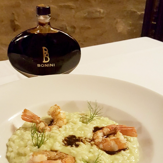 Herbs and prawns risotto with Bonini condiment Maturo