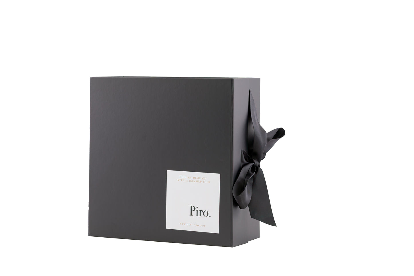 Olio Piro gift box with a white label on the front, adorned with a black ribbon, containing custom selections of Olio Piro and Bonini Balsamic  premium olive oil bottles